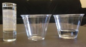 3 clear plastic containers- onw tall and skinny and the other two short and wide.