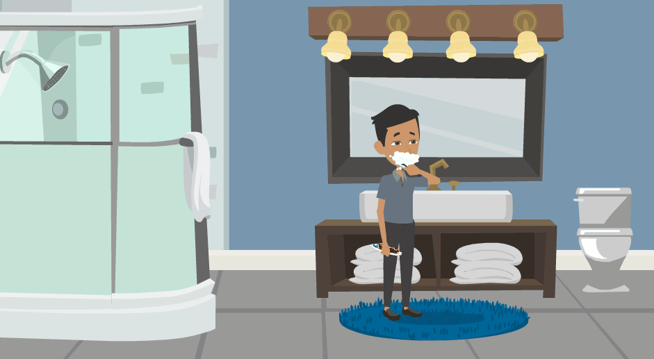 A man stands in front of a bathroom mirror brushing his teeth.