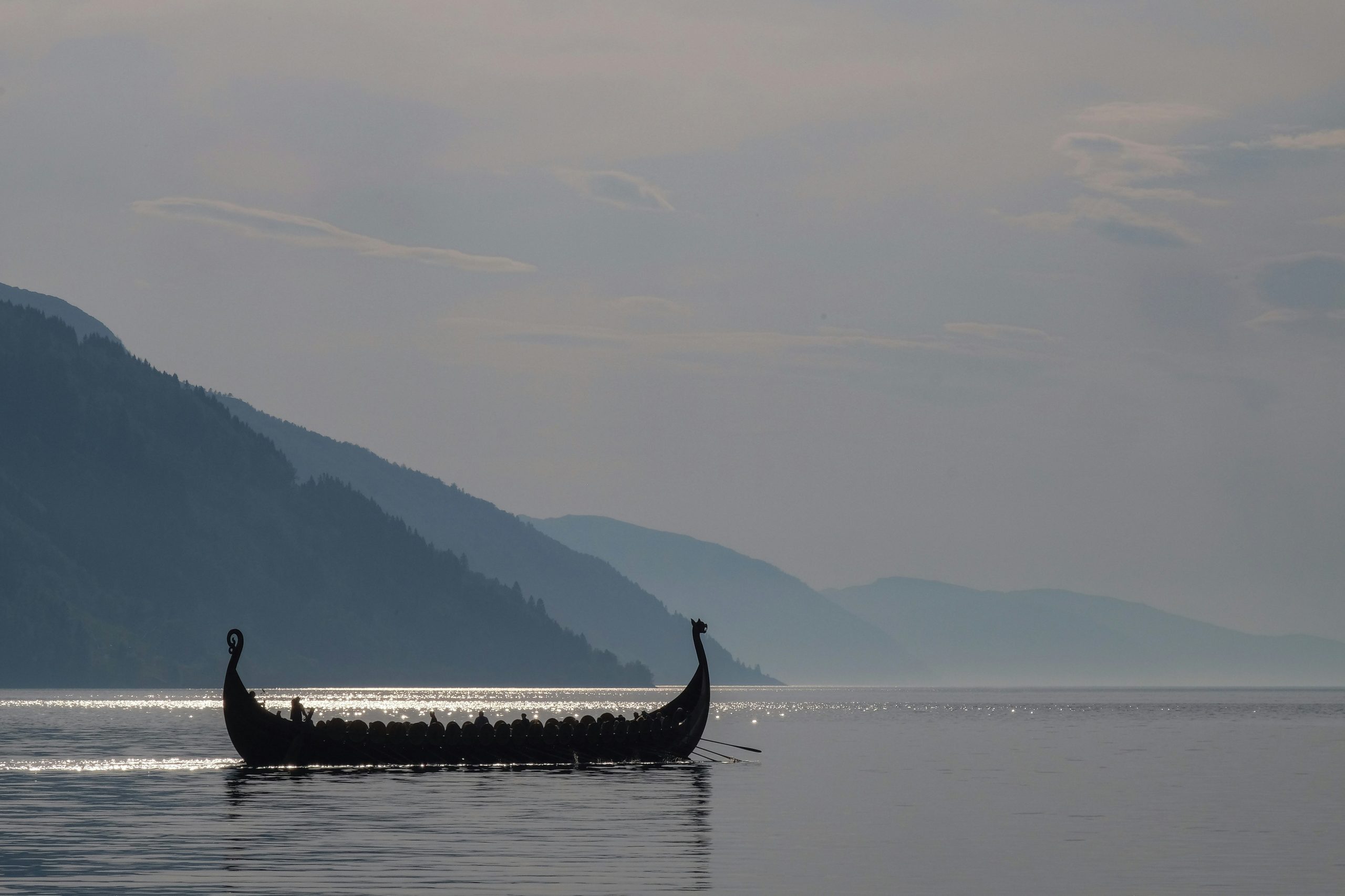 Image of a Viking long boat on the water in Norway.