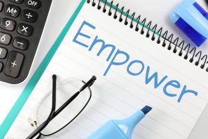 Empower written on a notepad