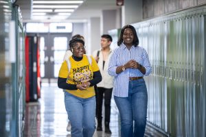 Students walking in Fanshawe college hallway