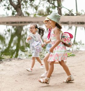 Photo of children playing outside.