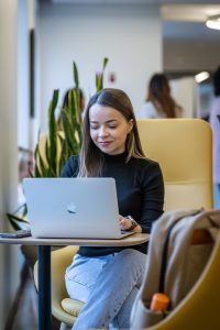 Photo of a Fanshawe student working on her laptop.