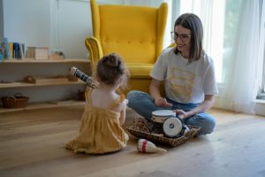 ECE interacting with a child.