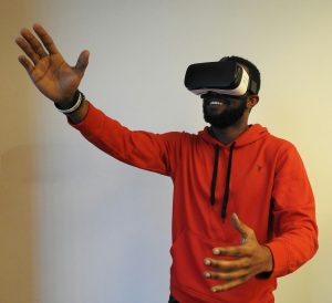 A student participating in a virtual reality experience.