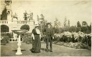 Photo of a couple in an elaborate garden