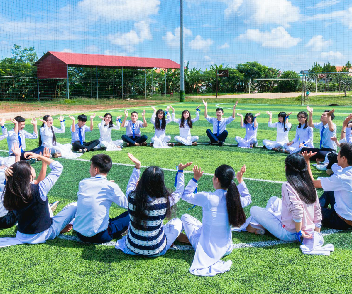 A group of students sitting in a circle.