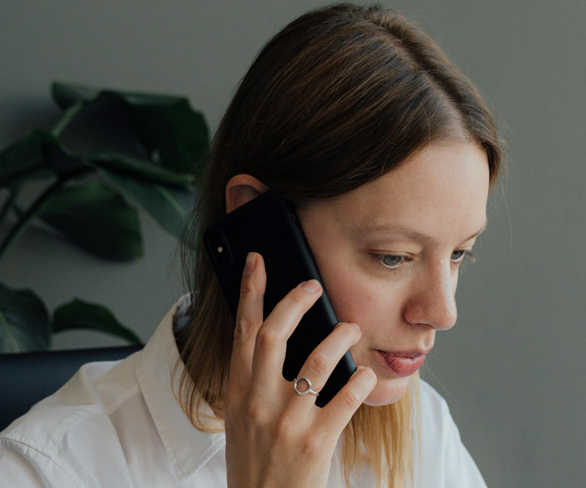 A woman talking on a cell phone.