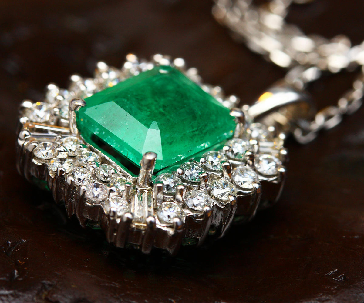 A green gemstone pendant.