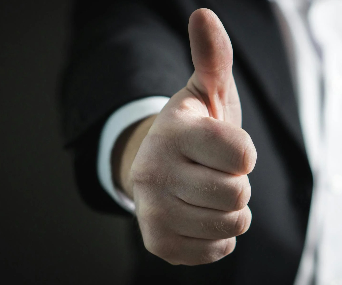 A person giving a thumbs up.