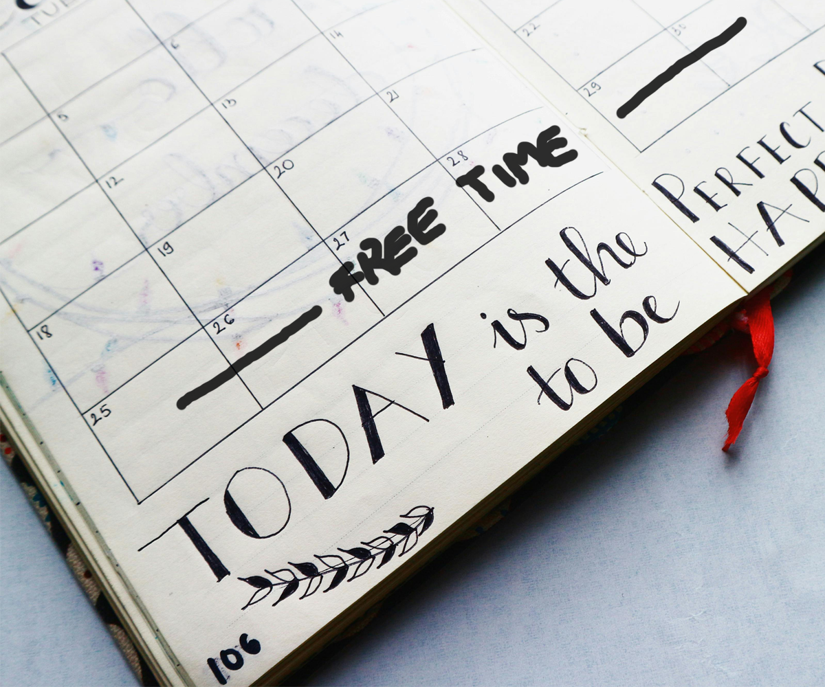 An agenda book with 'free time' written across the last week of the month.'