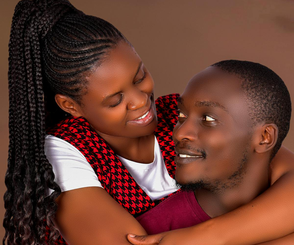 A couple looking lovingly at one another.