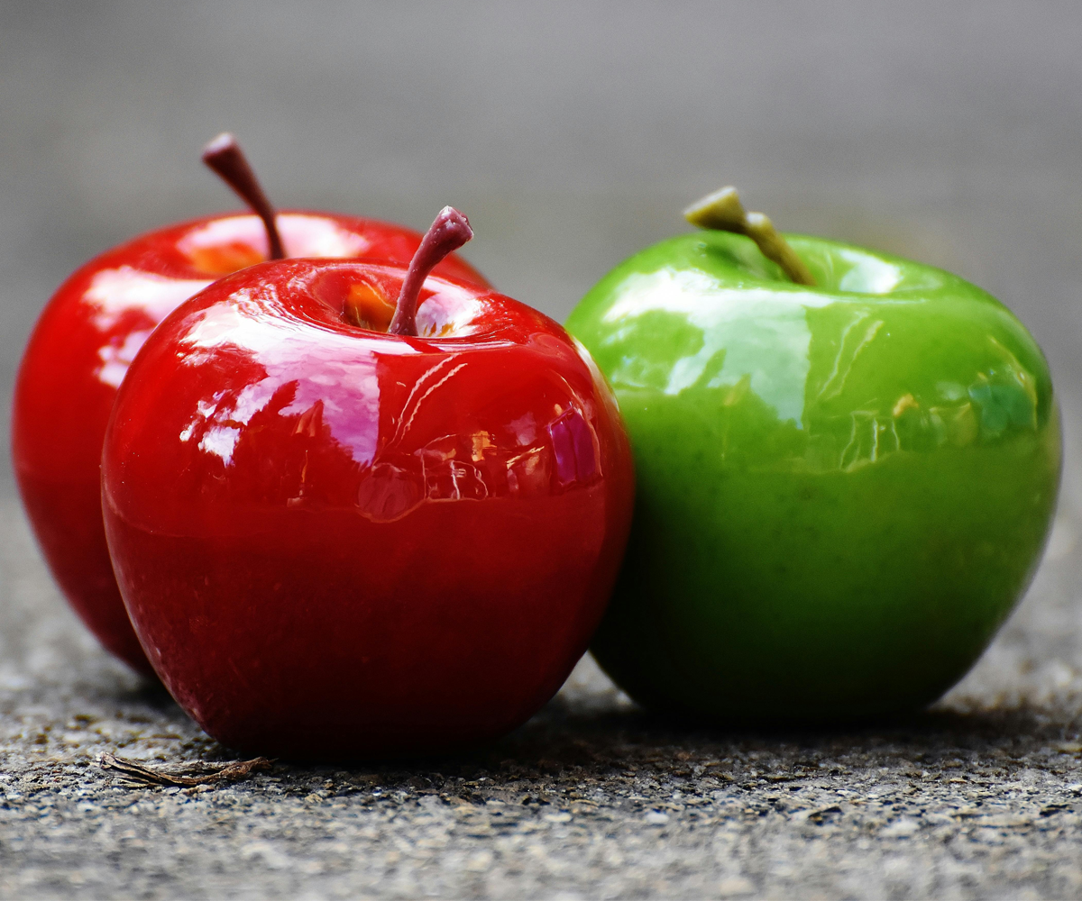 Three shiny apples.