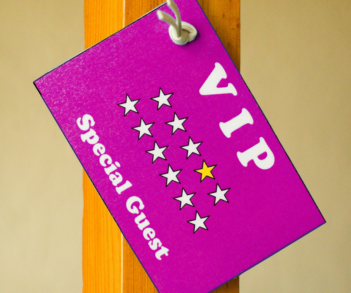 A bright name tag that reads 'VIP Special Guest.'