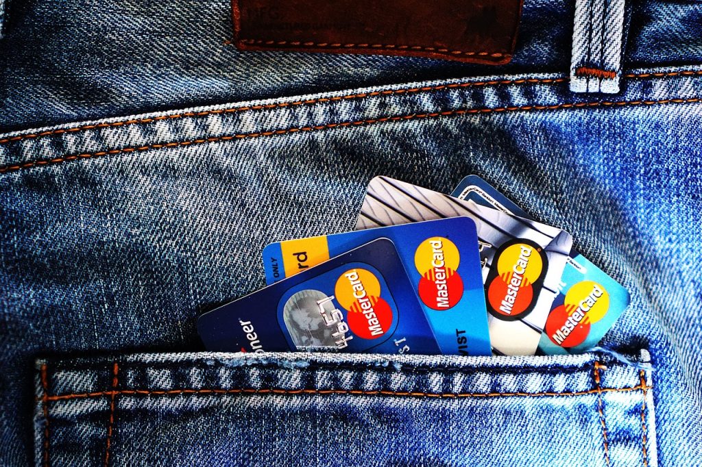 Credit cards in the back pocket of a person's jeans