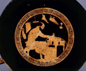 Vase painting of a shoemaker in his workshop