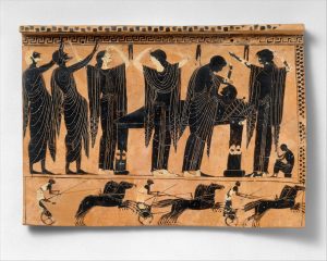 Terracotta plaque of a Greek funeral service. 6 figures standing, hands raised to heads, 1 figure lying down.