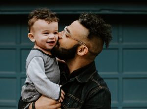 A father holding his son