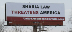 billboard with the words Sharia Law Threatens America