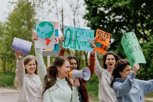 A group of people bringing advocating for the protection and preservation of the earth.