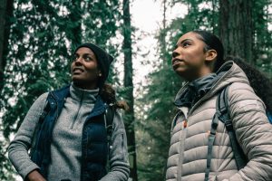 Naturalists exploring the woods.