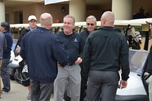 golf employees shaking hands