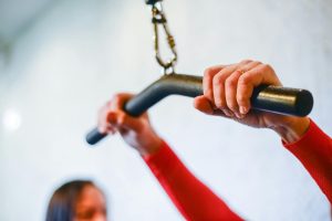 hands on a pull down bar