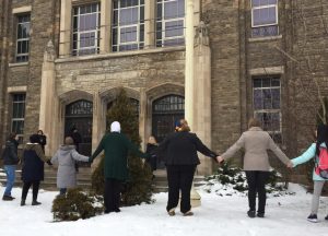 Westdale high school students holding hands at the ring of peace initiative held in February of 2017.