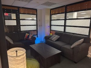 Comfy seating area with low lighting in CATS