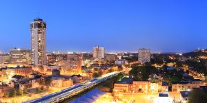 Hamilton skyline at dusk from a high balcony, shot in panorama
