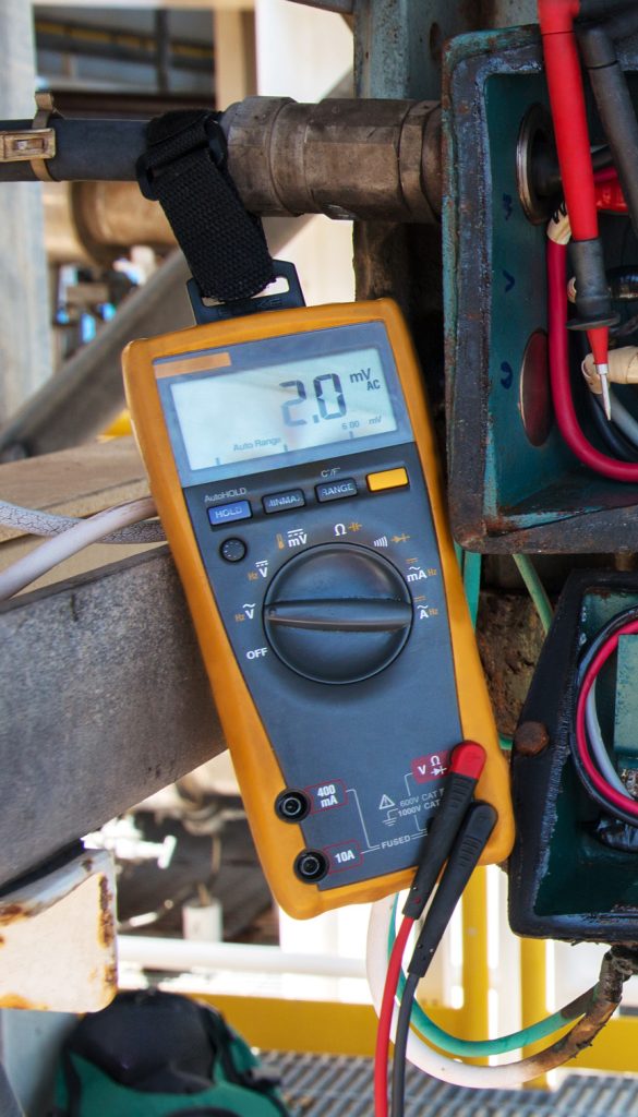 Multimeter that is safely tethered to a pipe