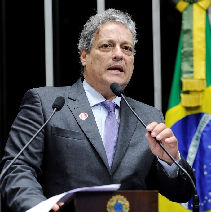 Man speaking at lectern 