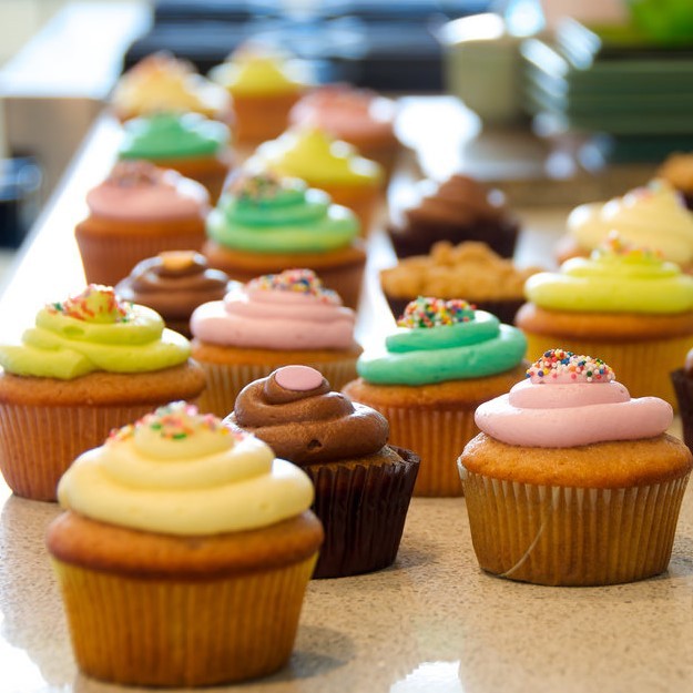 photo of a lot of cupcakes 