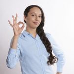 lady giving OK hand sign