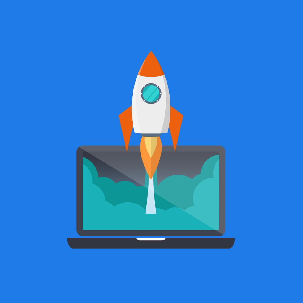Illustration of a laptop with rocket ship taking off on-screen.