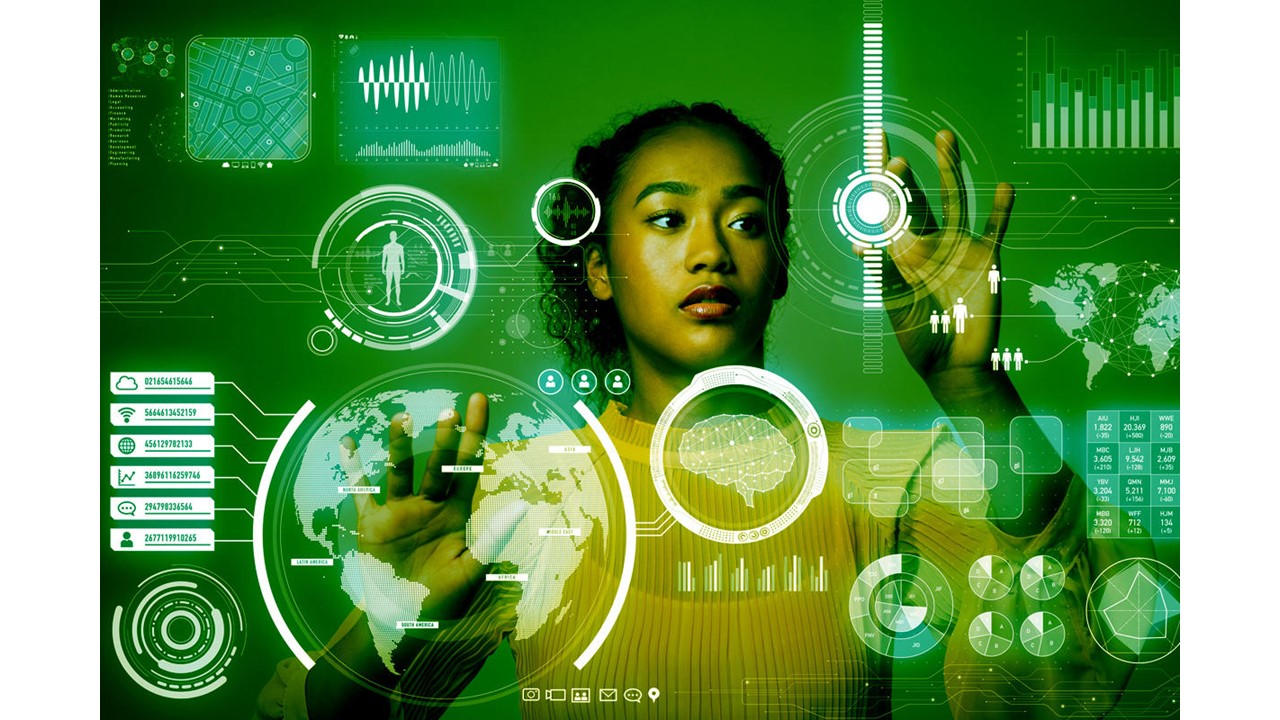 Young woman manipulating data on a futuristic touch screen.